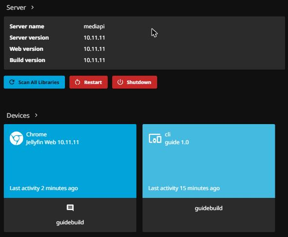 The Jellyfin dashboard after setup. A Server panel showing server name mediapi and server, web and build versions all 10.11.11, with Scan All Libraries, Restart and Shutdown buttons beneath it. Below that a Devices panel listing two connected clients, a Chrome browser and a command-line client, both signed in as the same administrator account.